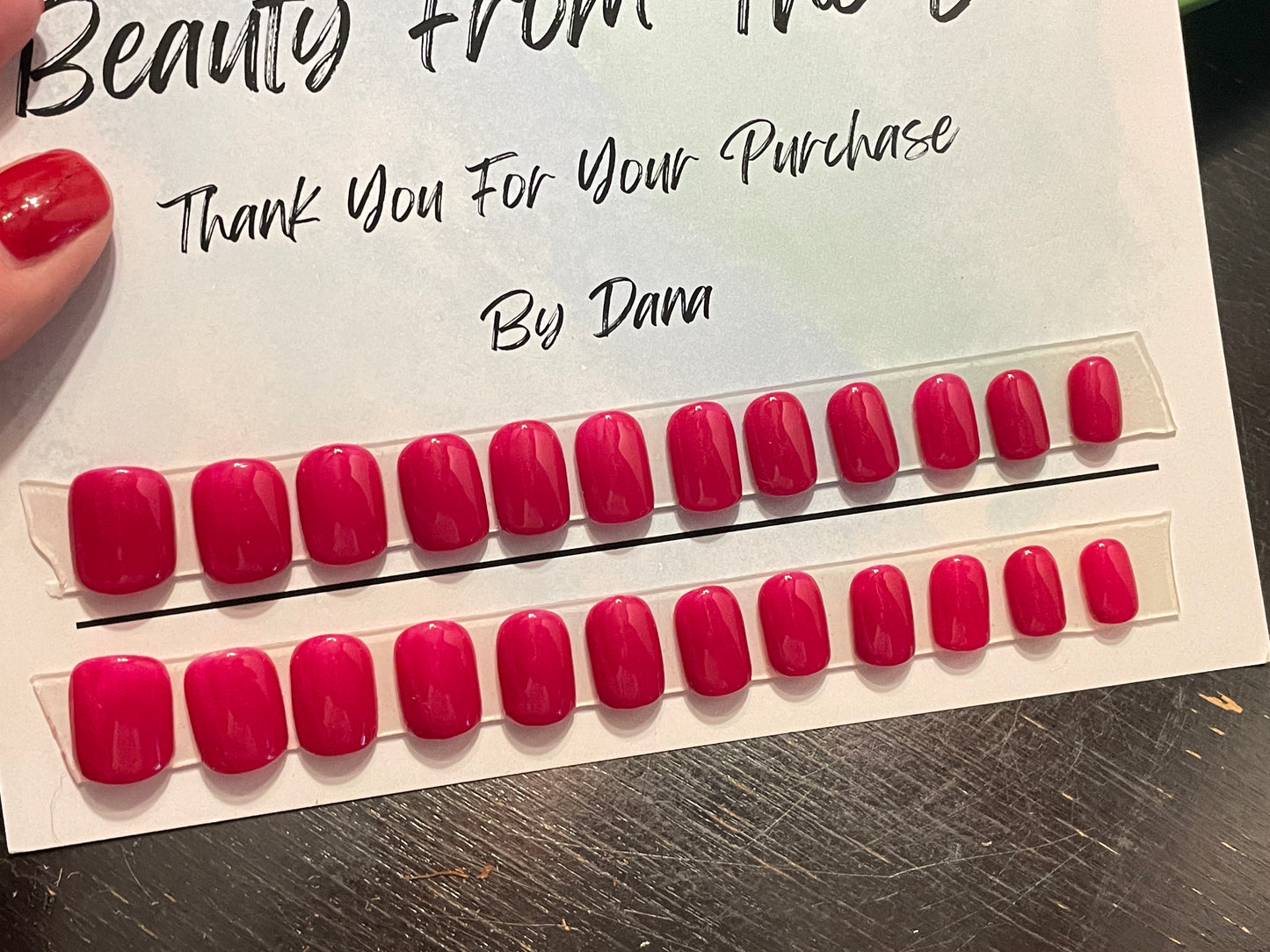 Great active length hand painted reusable press-on nails. Medium pink that are short square.