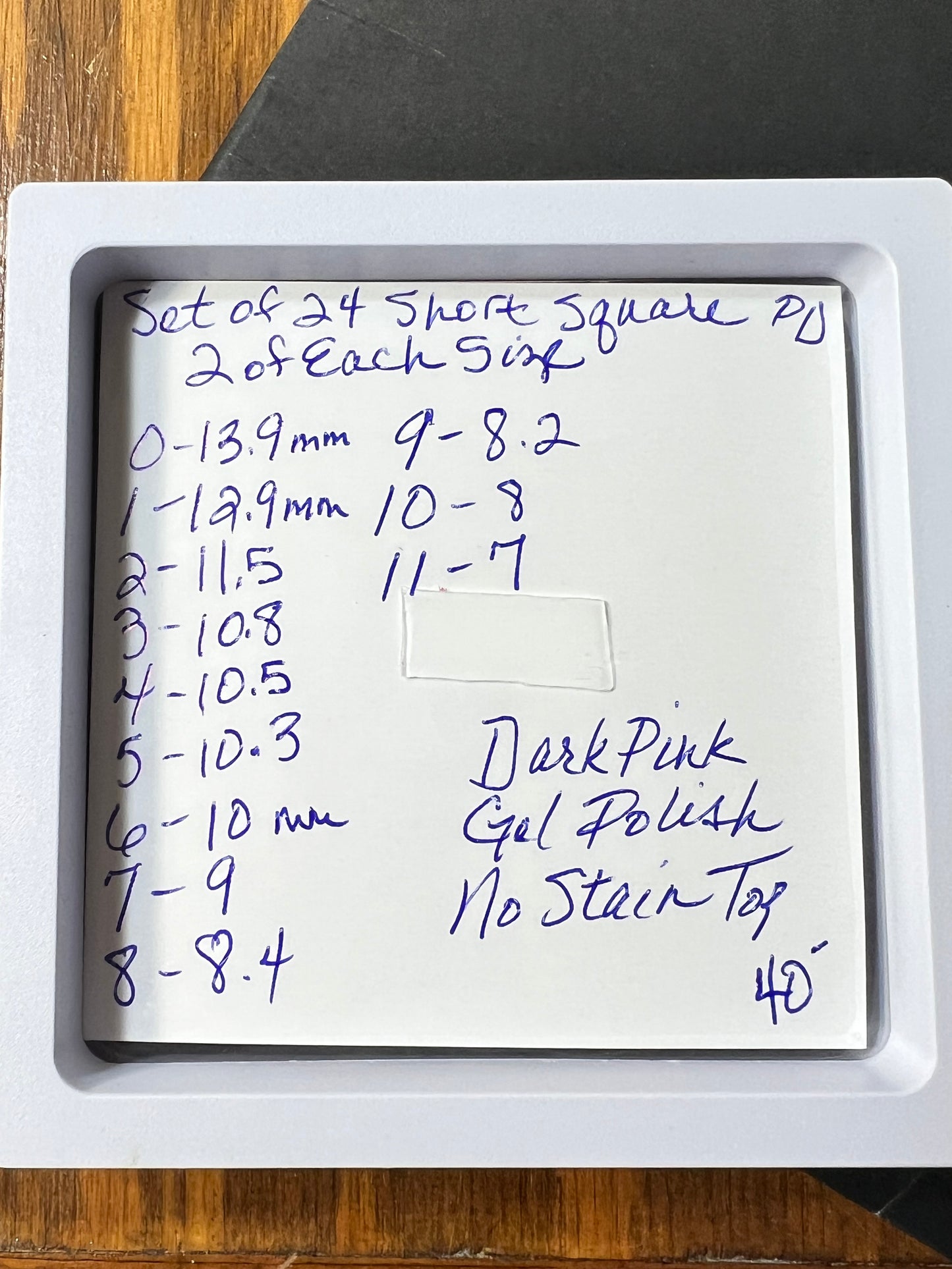 Explanation of the dark pink set of 24 short square nails.