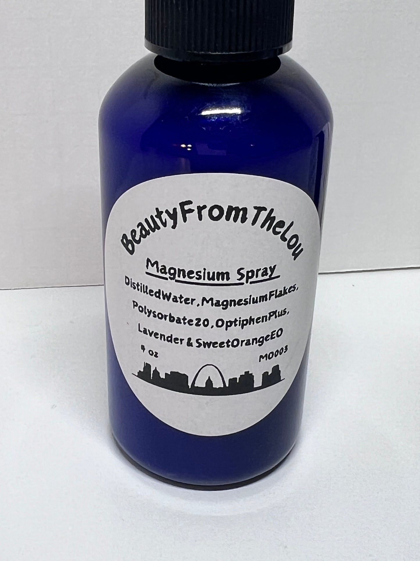4 oz blue bottle of magnesium oil spray