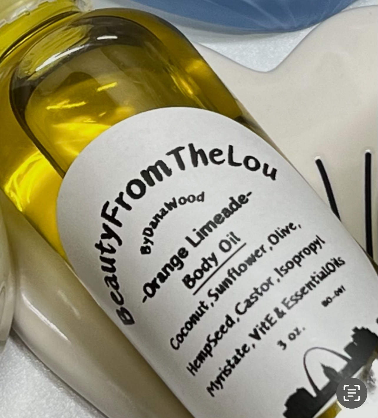Orange limeade scented body oil that's great for after shower or after you've been in the sun.