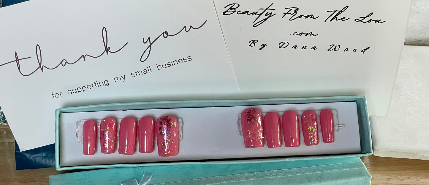 Size Large set of 10 medium length square nails. Included are 4 accent nails with the same medium shade of pink gel polish, with foil and a little glitter. No stain top coat.