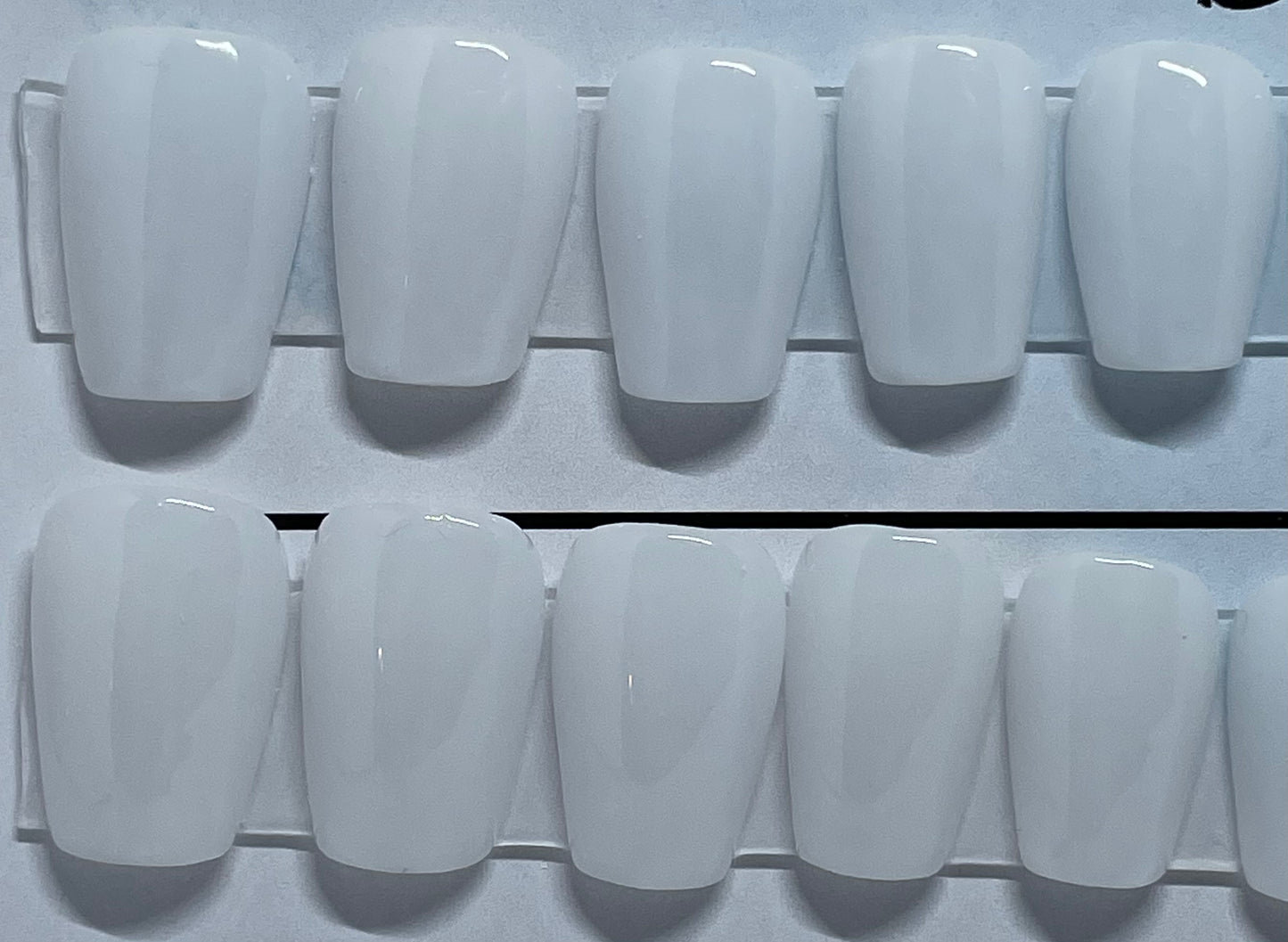 Professionally hand painted Milky white, extra short coffin nails.