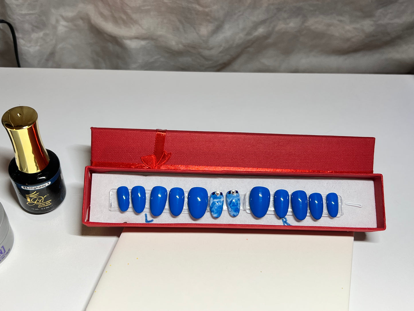 Size Large hand painted Press On Nails. Blue gel polish that goes with everything.