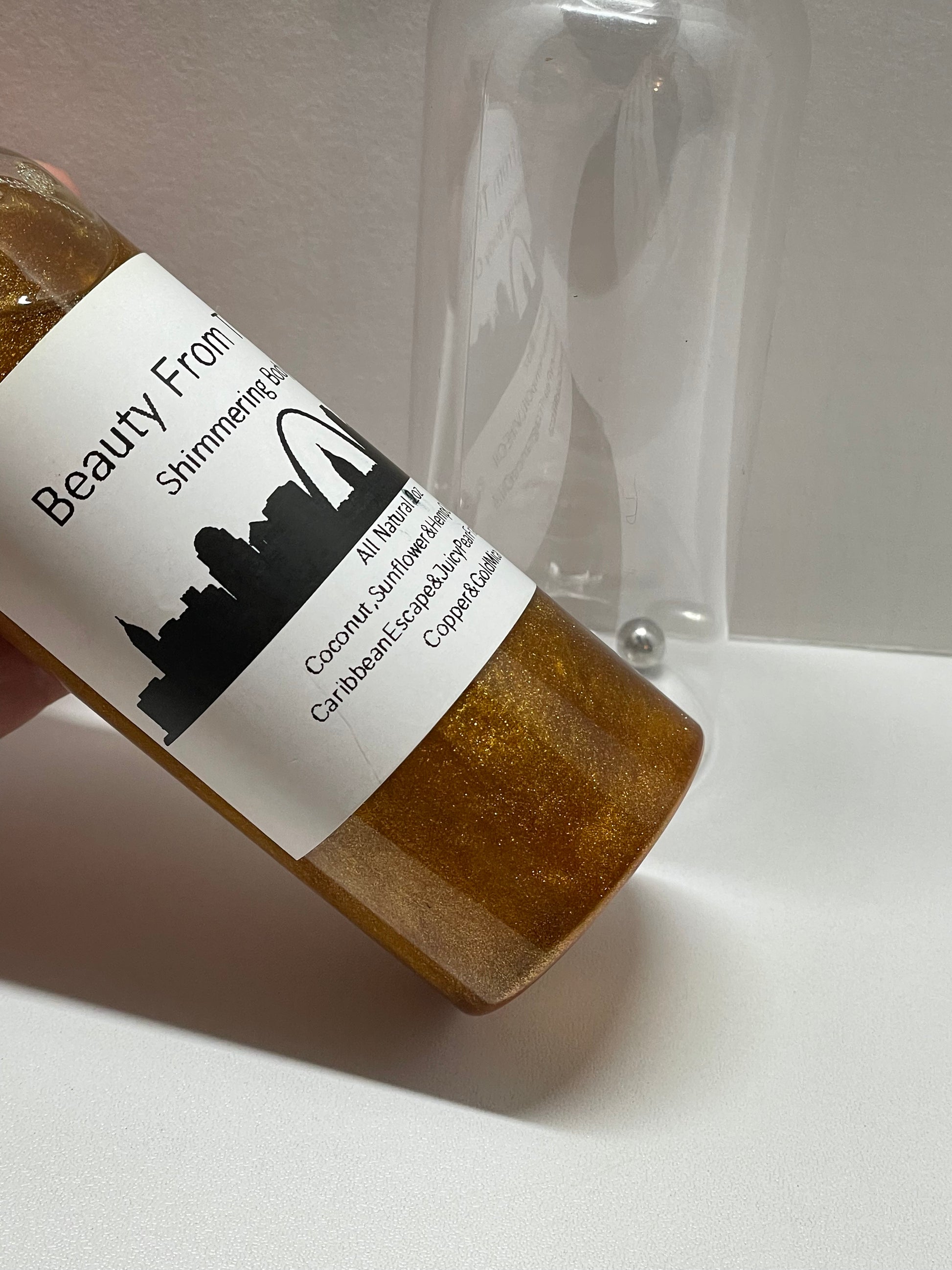 A beautiful handmade all natural 3.4 oz.  body oil with a shimmer!