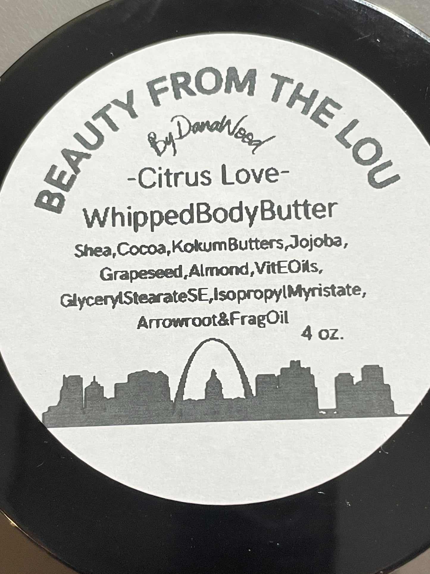 Sustainable all natural and organic hand whipped handmade body butter in 4oz jar