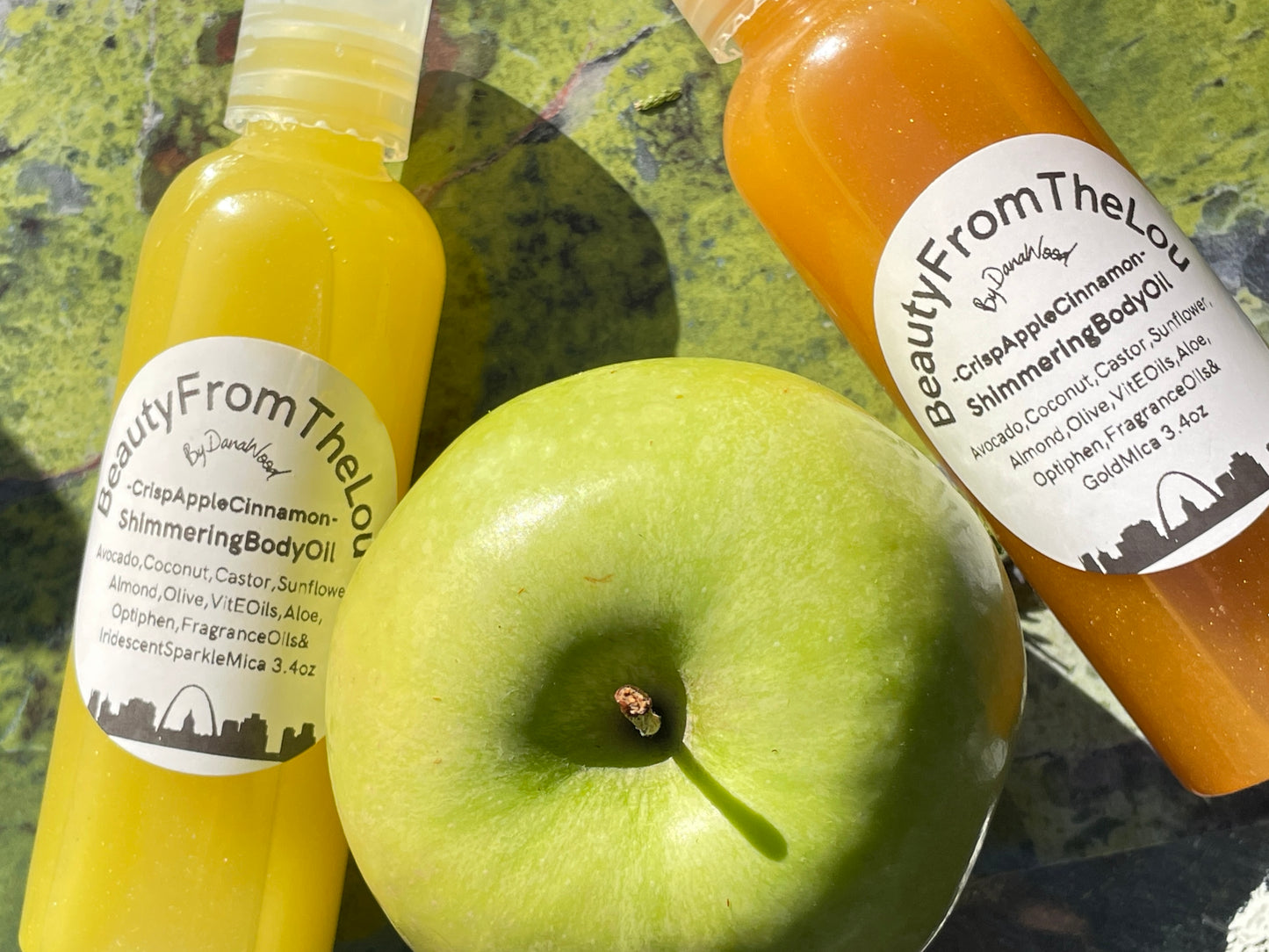 Homemade all natural shimmering body oils. Size 3.4 oz. made by a professional Nail Tech. There's an apple in the pic just for appeal. 