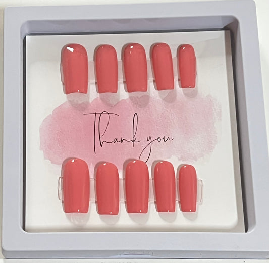 Set of 10 size extra small with medium length square light pink gel polish and no stain top coat. 
