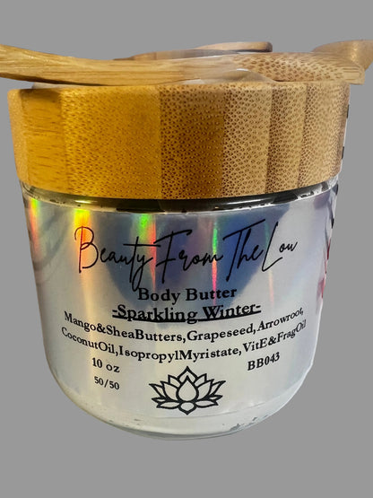 10 oz Glass Jar with bamboo lid of body butter with spoon on top for application