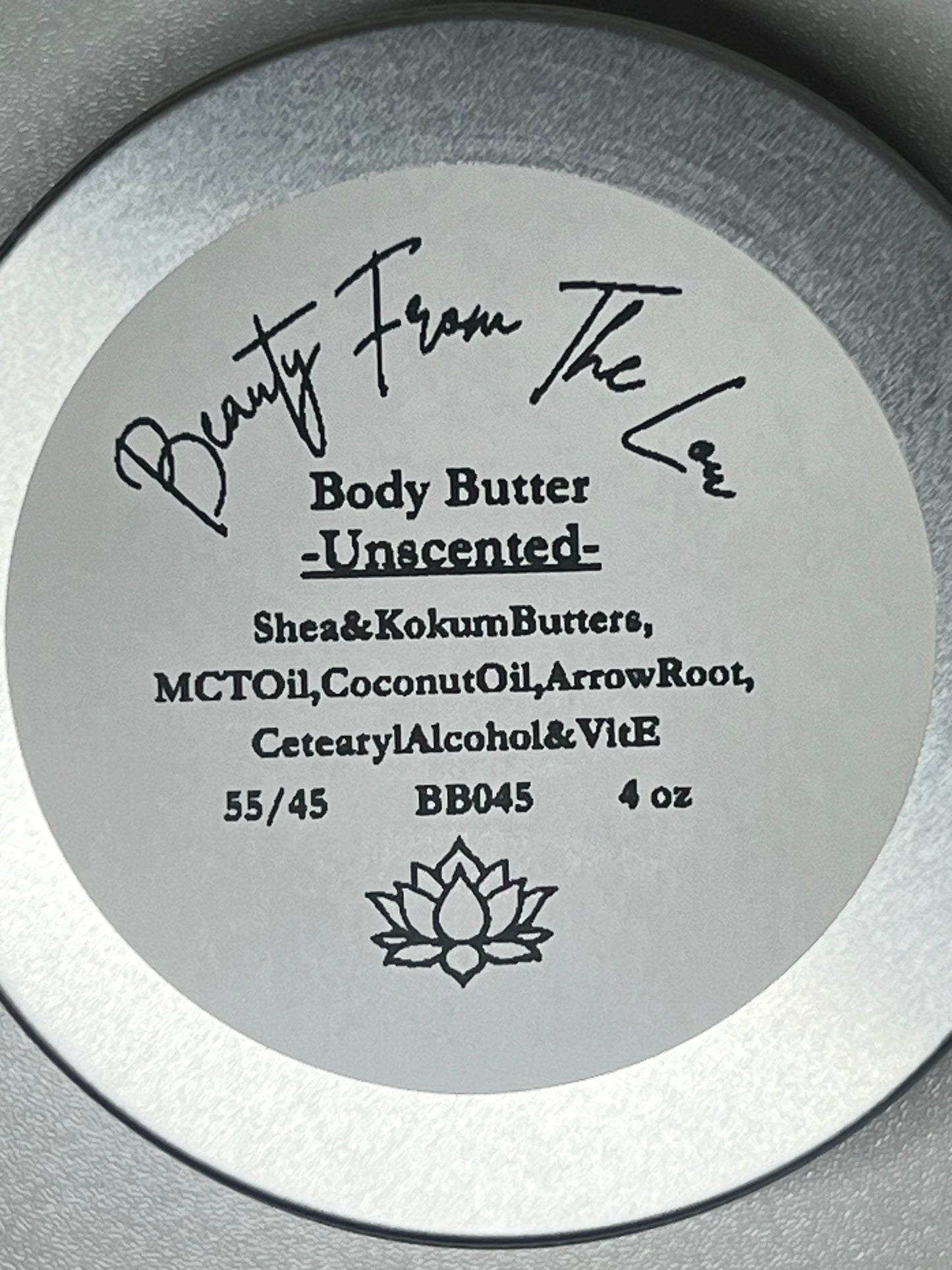 Body butter container label with branding and product details on a gray background
