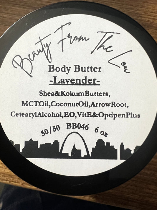 Body butter container with label on a wooden surface