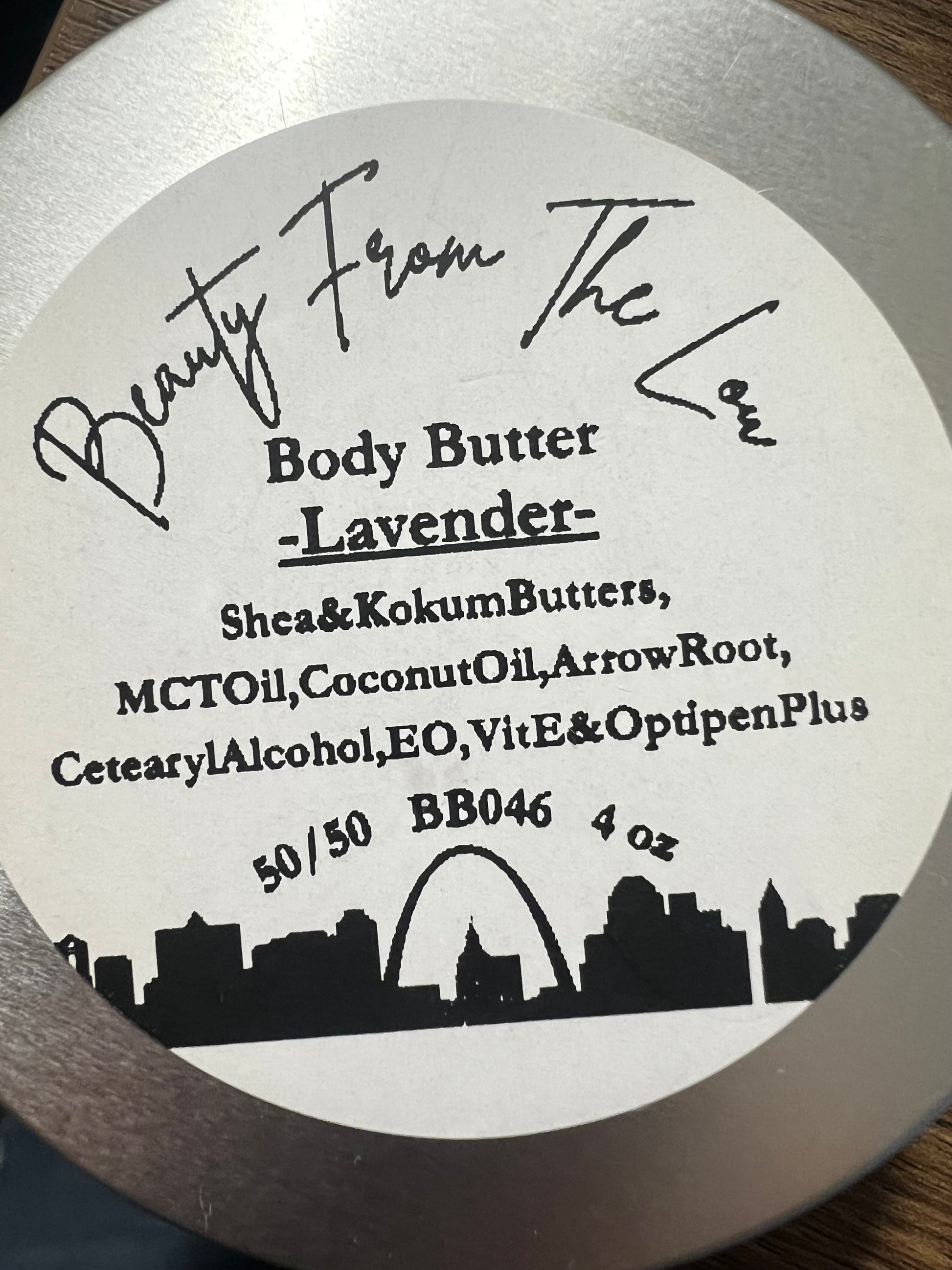Body butter container label with 'Beauty From The Lou' branding and product details.