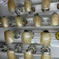 Fun Hand Painted set of 24 nails for anytime and anywhere. A short active length for the busy on the go ladies. A soft gold glitter gel polish.
