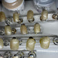 Sizes 0-11 with 2 of each size. Hand painted with gold glittery gel polish.