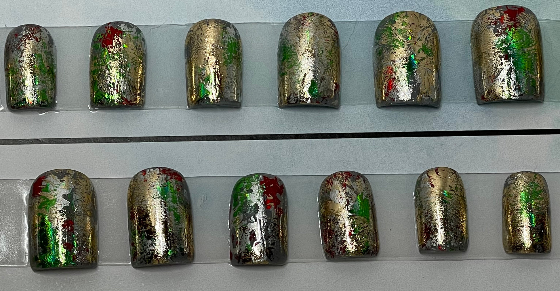 Professionally hand painted Set of 20 holiday nails to wear to parties or just wear through the whole holiday season.