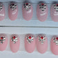Hand Painted pink nails with The one red stone just adds that little pop of color!