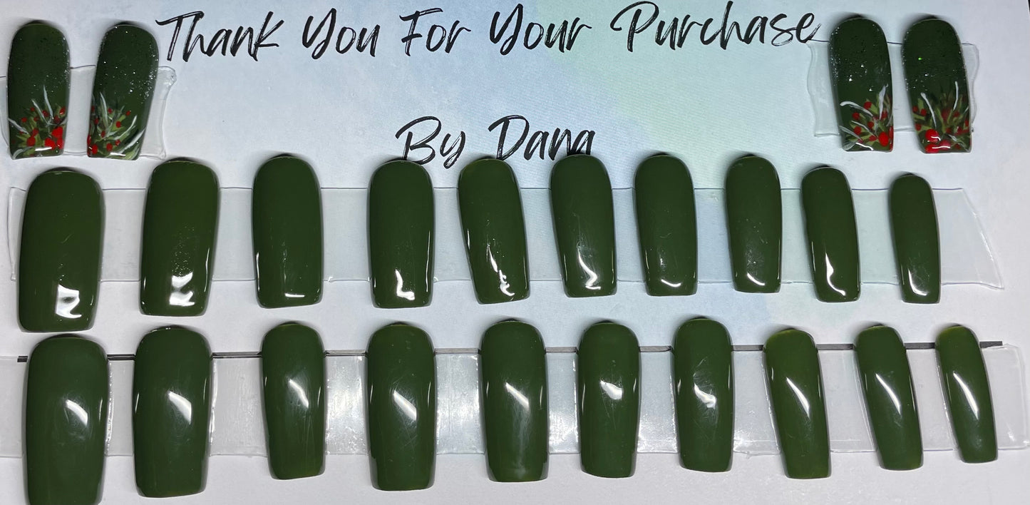 A dark green with accents that have some holly on them with the gold glitter by the cuticle. All professionally hand painted!