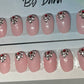 A great set for Valentine's Day. Hand painted with pink gel polish and a few stones at cuticle.