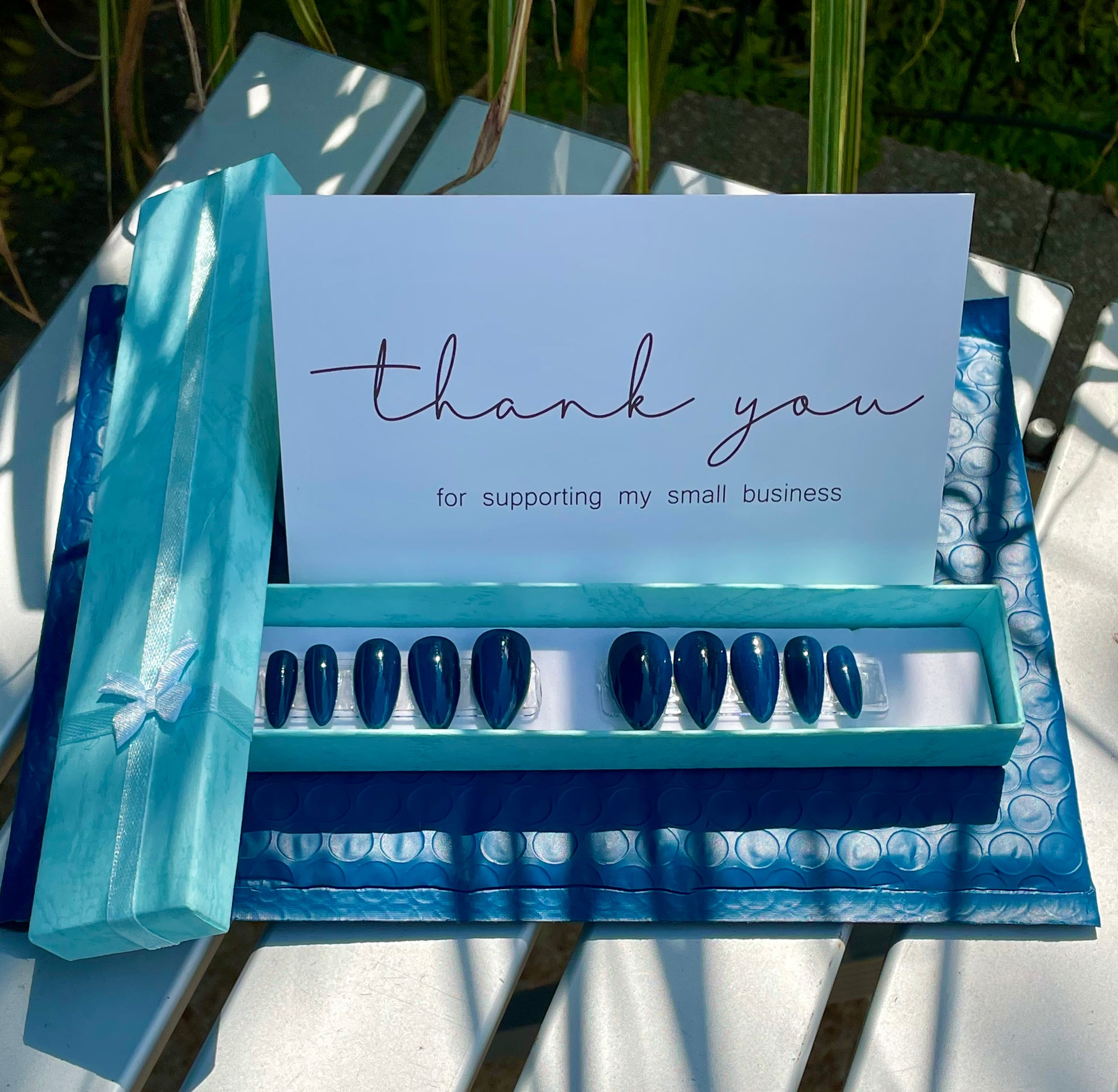 Professionally Hand painted reusable Dark Blue short stiletto nails in a Set of 20
